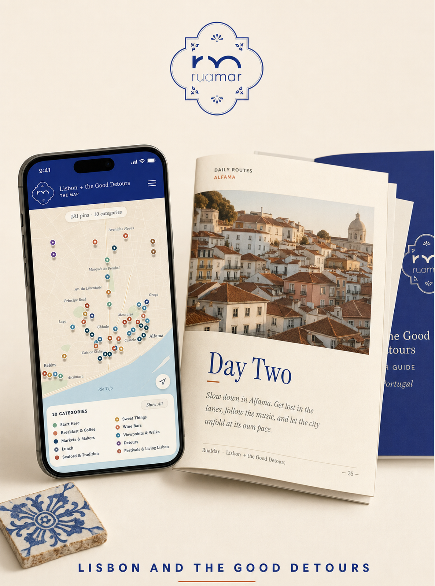 Phone displaying a travel app and a guidebook titled 'Lisbon and the Good Detours' on a light background.